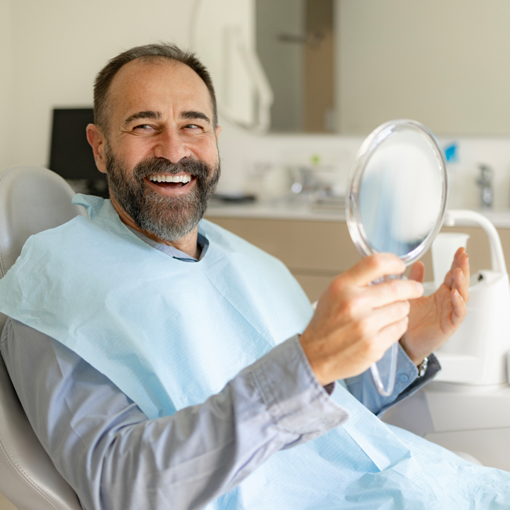 Why Choose Dental Implants Over Dentures?